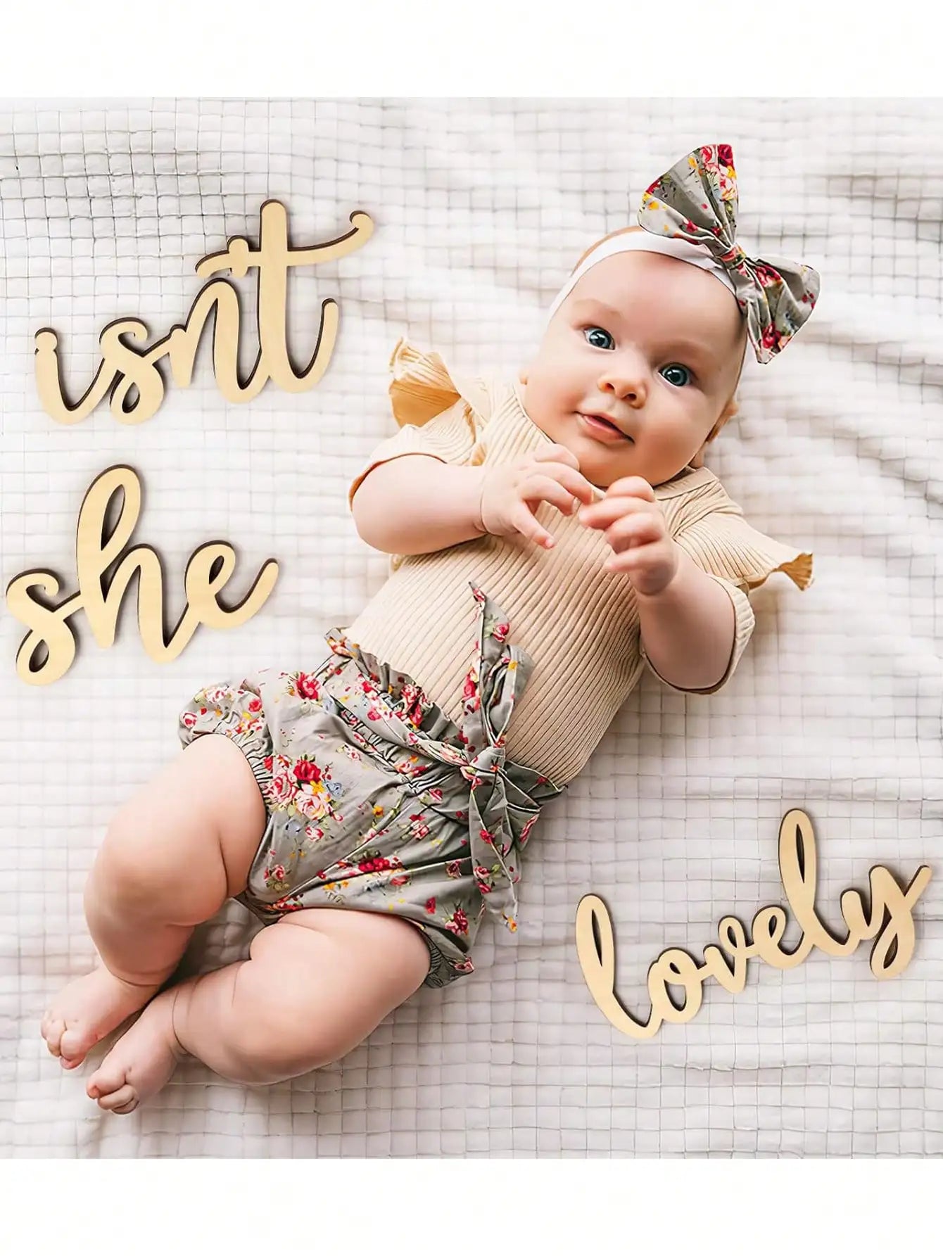 Frase decorativa “Isn’t she lovely”