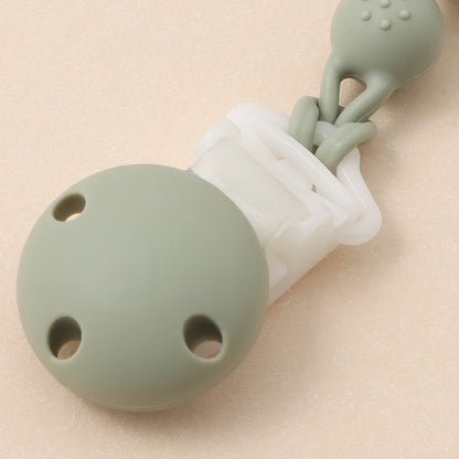 Clipe de chupeta em silicone – design arco-íris com relevo sensorial