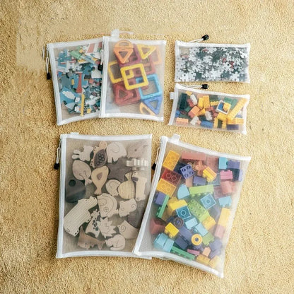 Bolsas “Puzzle Pouch” – Organizador Transparente com Fecho