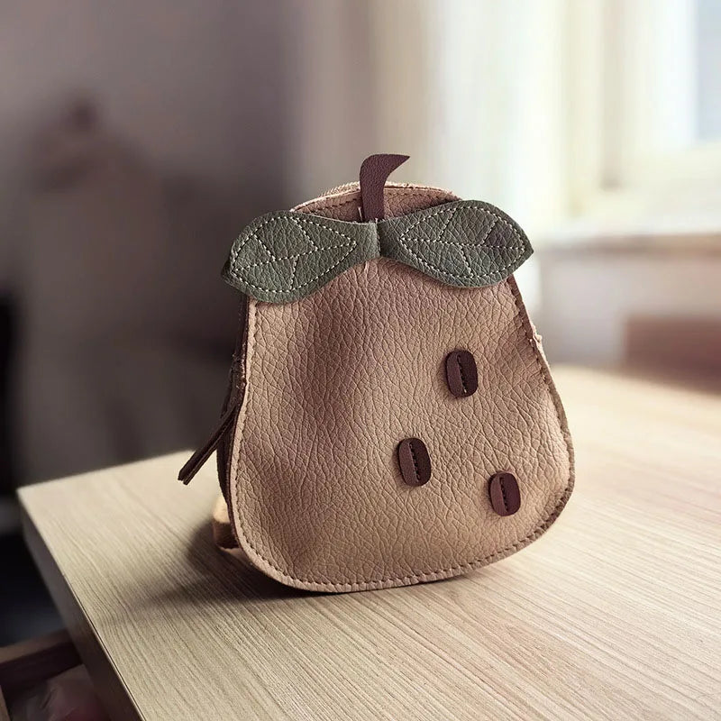 Mochila infantil em forma de abóbora e pêra – Estilo e doçura às costas