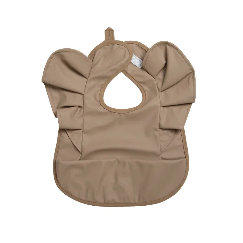 Babete Impermeável com Folhos – Elegância e Proteção à Hora da Papa