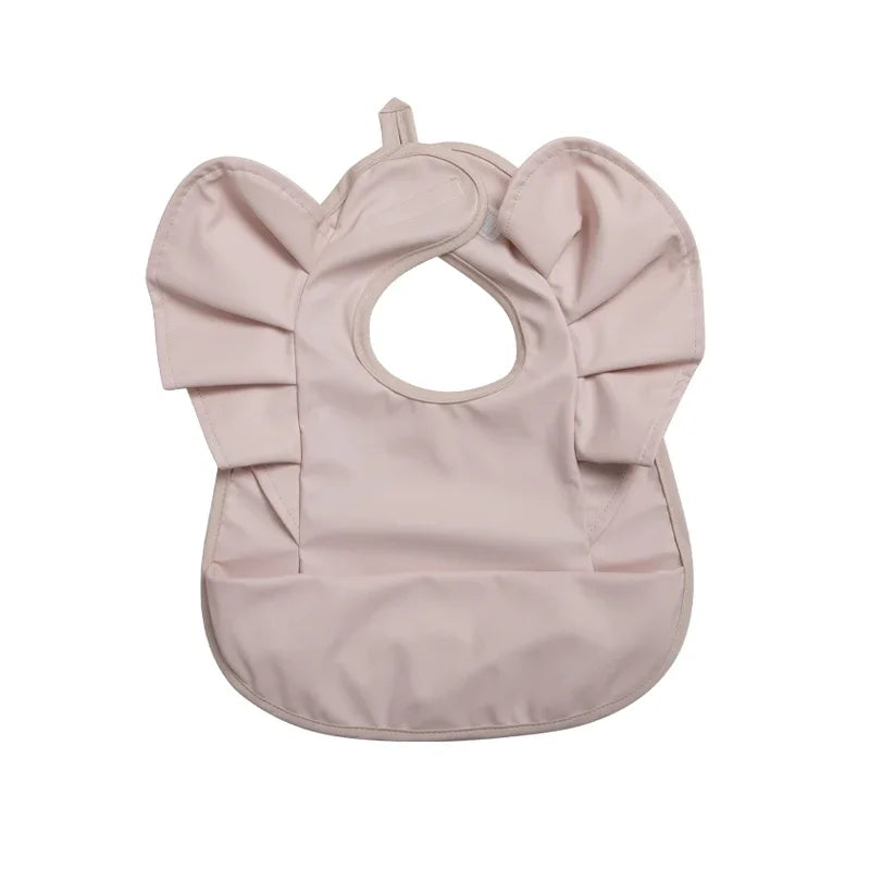 Babete Impermeável com Folhos – Elegância e Proteção à Hora da Papa